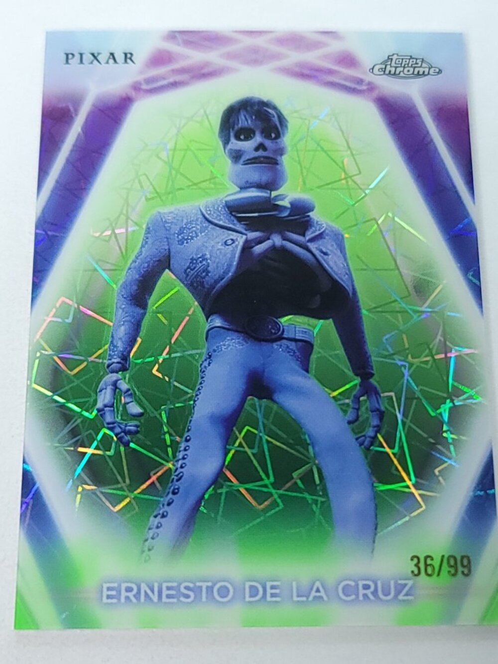 Ernesto De La Cruz Topps 2026 Disney Chrome Neon Green Limited 36/99